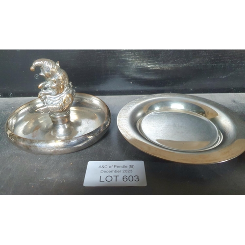 603 - Silver plated dish in traditional plain form together with an unmarked white metal shallow bowl with... 