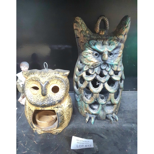 612 - Two large cast iron candle holders in the form of Owls (2)