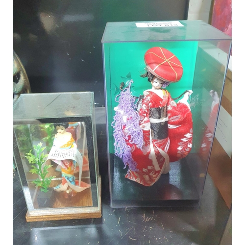 613 - Two, small, boxed, Japanese dolls (2)