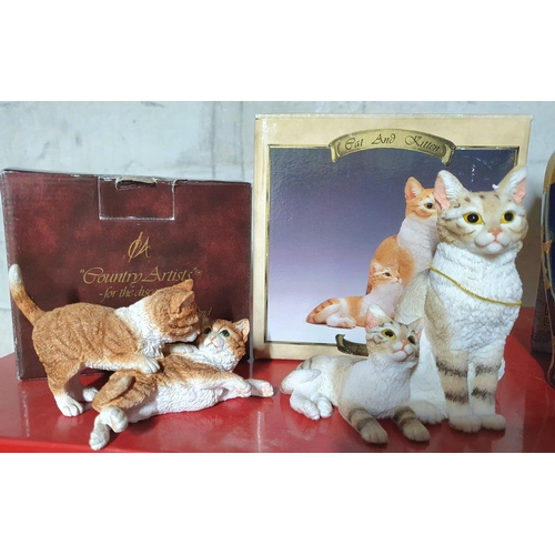 726 - Four boxed as new figurines and vases including a Country Artists cat (4)