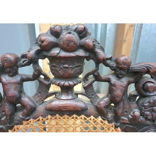 451 - Extensively carved with rattan back Jacobean style antique chair with barley twist stems (a/f)