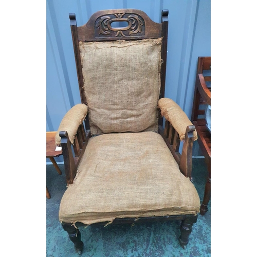 452 - Victorian armchair with original casters (a/f)