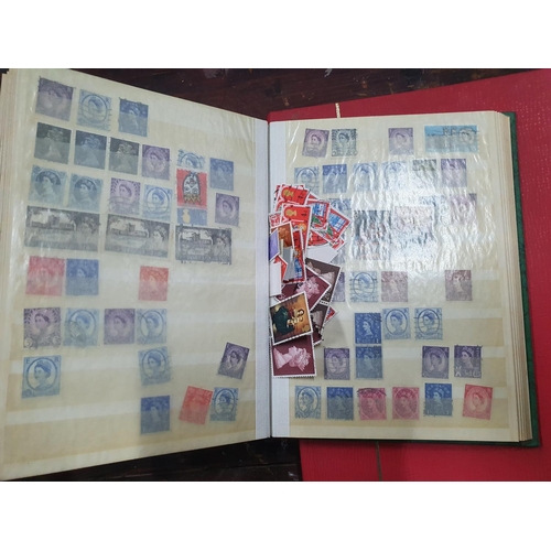 281 - Three stamp albums, the largest and one green mainly empty, some 20thC GB, mainly used, the other gr... 