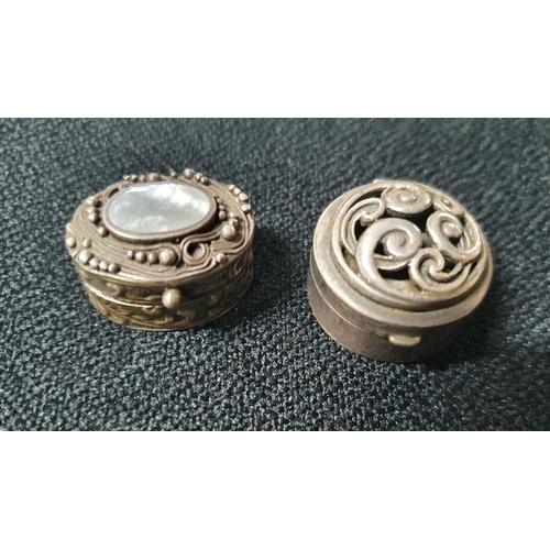 18 - Two modern sterling silver pill boxes with ornate lids (2)