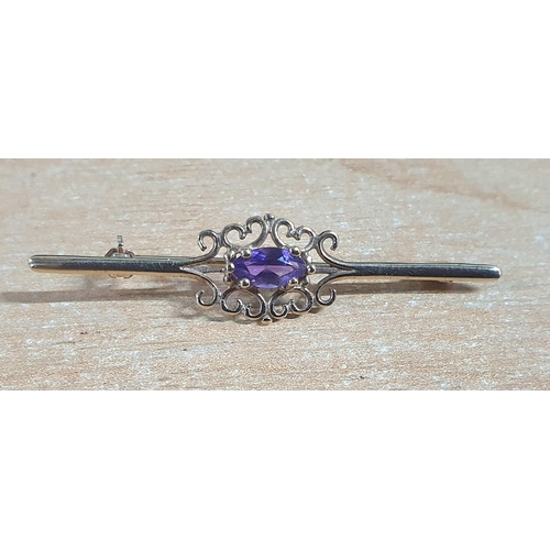 26 - 9ct yellow gold antique bar brooch with central solitaire Amethyst,

2 grams gross