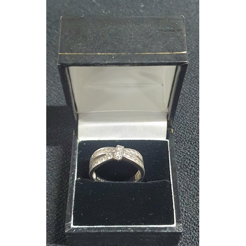 55 - Heavy silver twist ring with CZ in presentation box,

size T