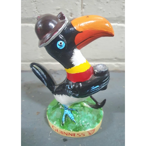 102 - Painted cast iron Toucan miner, Guinness,

16cm tall