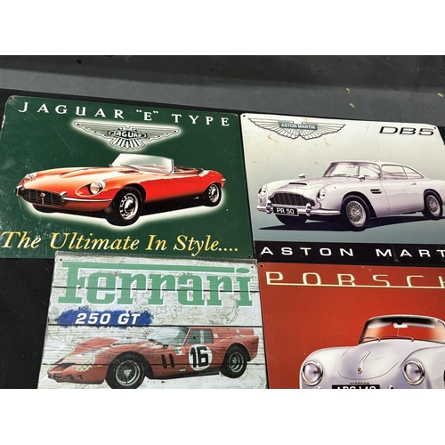 126 - 4 Car signs including Aston Martin