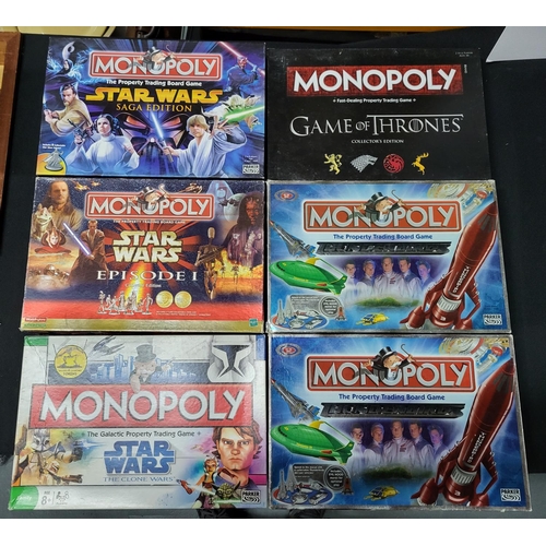 155 - 6 Monopoly Board games with all peices, including Star wars and Game of Thrones