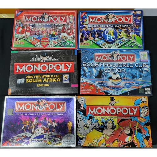 156 - Six Monopoly board games mainly football themed (6)