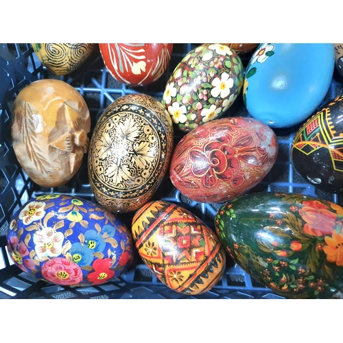 226 - Large quantity of wooden polished and/or hand-painted eggs (Qty)