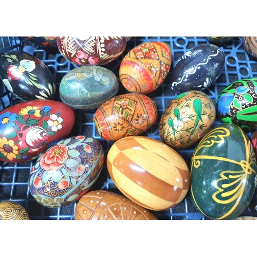 226 - Large quantity of wooden polished and/or hand-painted eggs (Qty)