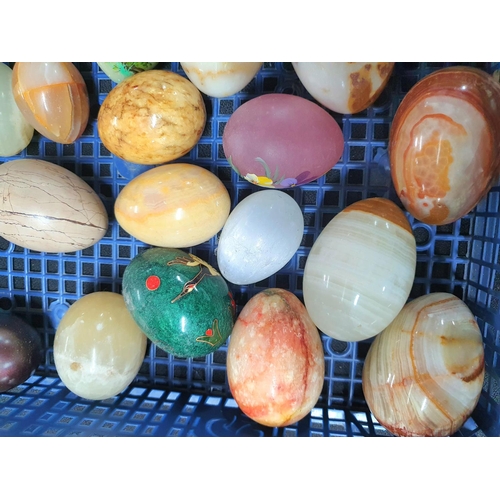 227 - Large quantity of polished hardstone eggs, a few hand-painted (Qty)