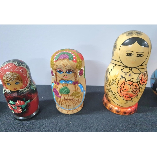 230 - Five hand painted Russian Matryoshka dolls together with 2 other similar items (7)