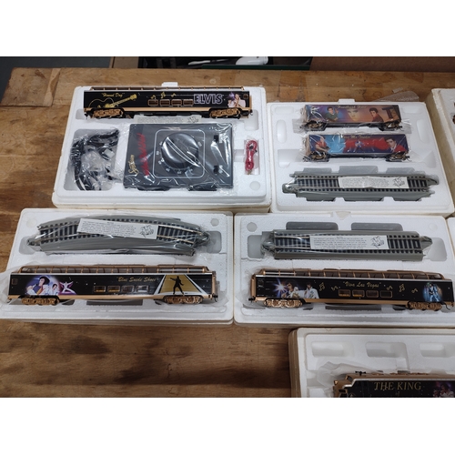 217 - Collection of various Elvis Presley locomotives, tracks and controllers etc. all boxed, as new (Qty)