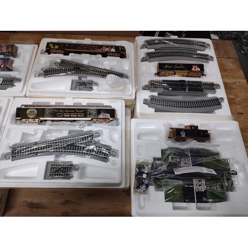 217 - Collection of various Elvis Presley locomotives, tracks and controllers etc. all boxed, as new (Qty)