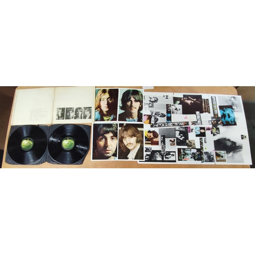 341 - Collection of The Beatles LP's including White Album complete with serial no. 0528904, band member p... 