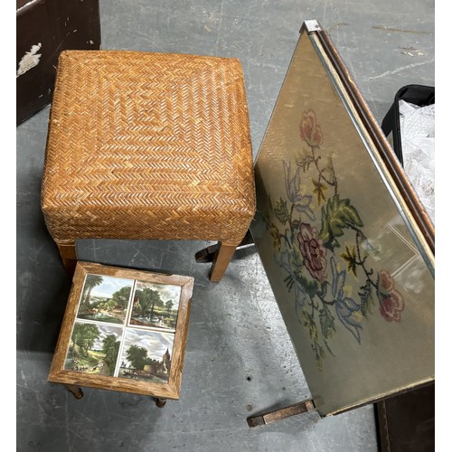 449 - An embroidered and glazed tilt-top table together with a with vintage stool and a hand-painted tiled... 