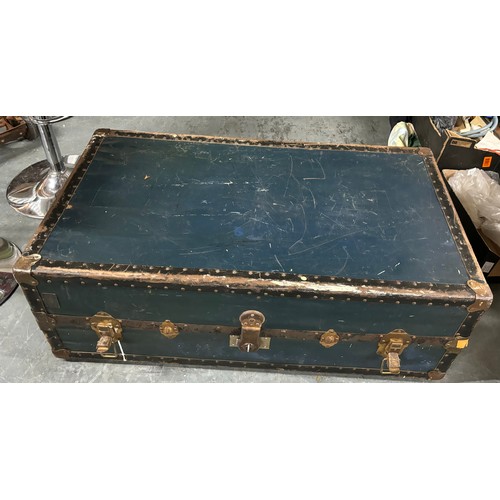 467 - Vintage trunk with brass escutcheons and studded edging