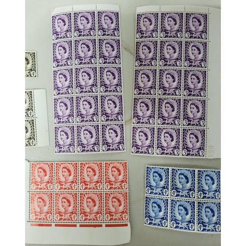 614 - Quantity of GB QEII regional definitives Wales, all mint unmounted blocks, etc, some with side bars ... 