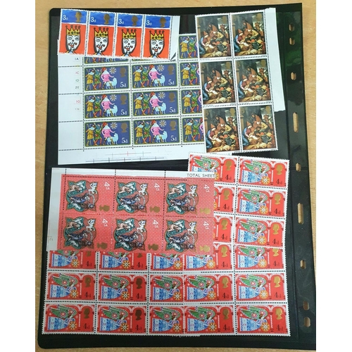 642 - Double sided sheet containing GB QEII pre-decimal Christmas stamps, all mint unmounted blocks, some ... 