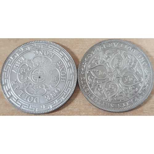 665 - Two large old British silver coloured coins, a QV Hong Kong $1, and a George V Straits Settlements £... 