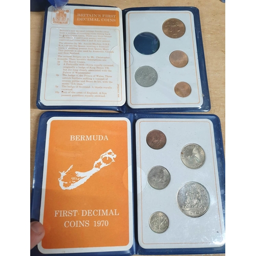 694 - Various GB commemorative coin sets and coins (5)