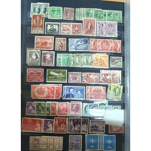 725 - Red album containing a large quantity of Commonwealth stamps including some 19thC examples, good Can... 