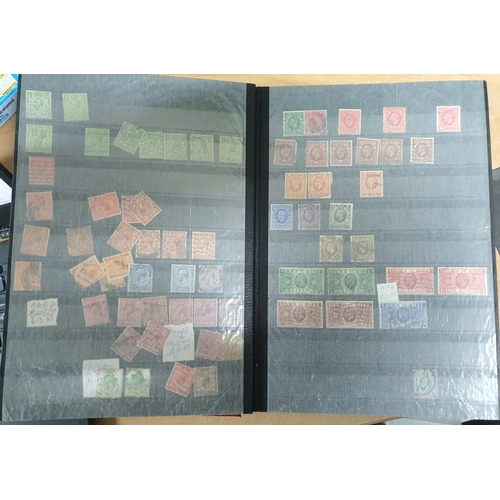 727 - Red stamp album containing a quantity of GB QV used 1d purples together with a large quantity of GB ... 