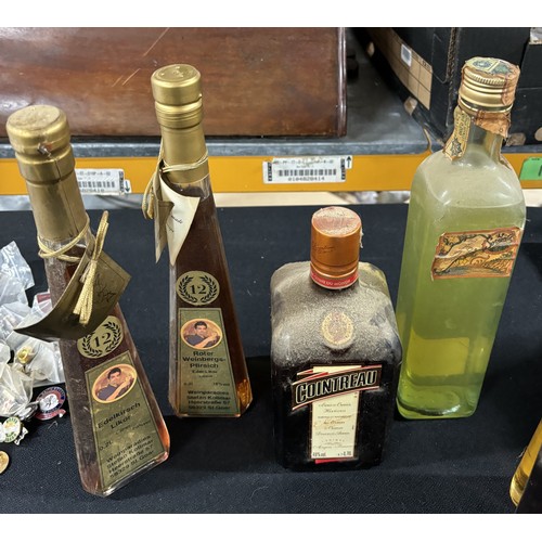 193 - 4 Bottles of alcohol, including Cointreau