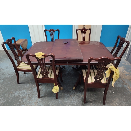 304 - Regency-style extendable dining table with six matching upholstered dining chairs, dual tilt-top ped... 