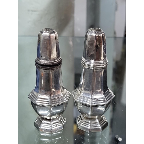 19 - Pair of stamped 925 silver salt and pepper shakers