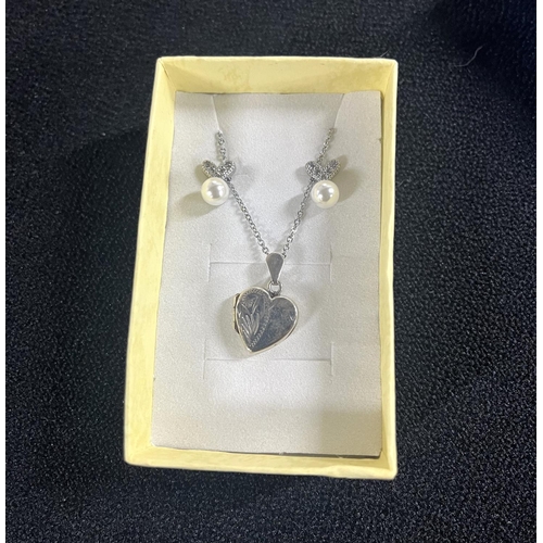 34 - Silver heart locket on chain with earings along with blue glass heart on silver chain and earrings (... 