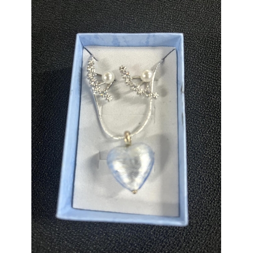 35 - Silver glass heart on chain with earrings along with large pendant on silver chain (2)