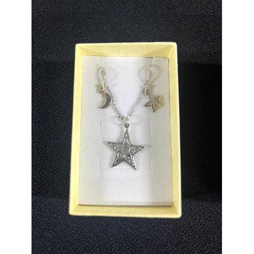 36 - Silver star pendant on chain with moon and star earrings along with Amyethyst pendant on silver chai... 