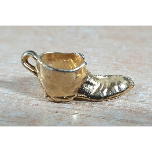 47 - Unmarked gold boot charm, 4.3 grams