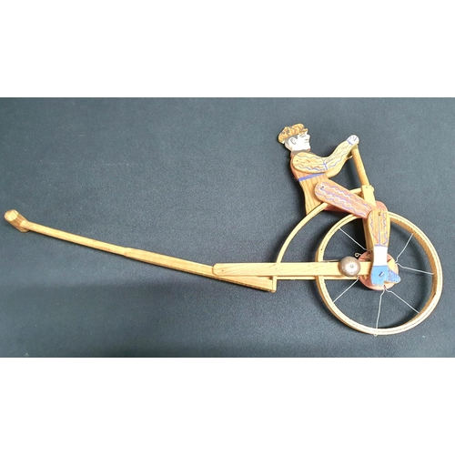 76 - Unicycle wooden painted puch toy