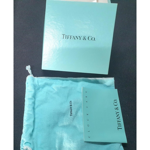 129 - Tiffany clock box with papers and bag