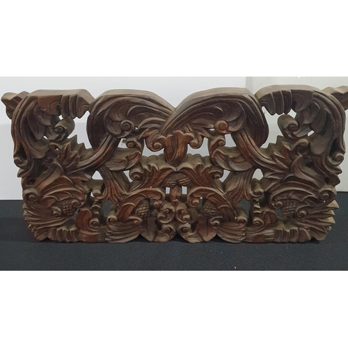 139 - Finely carved hardwood panel,

26 x 51cm