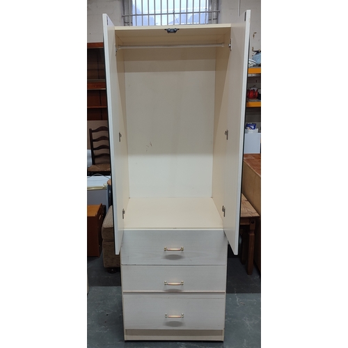 294 - Slender cream single wardrobe with mirrored front above three drawers