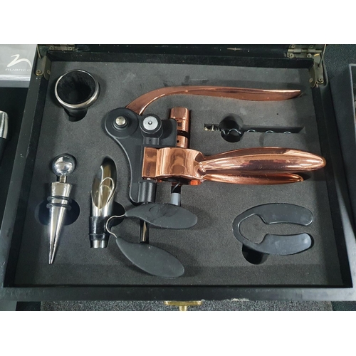 97 - Corkscrew set with other wine accessories