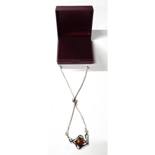 18 - Modernist 925 silver extending bracelet with Amber pendant in presentation box

4.6 grams gross