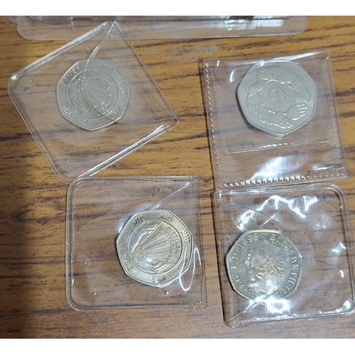 779 - Collection of QEII Commemorative coins and 50ps