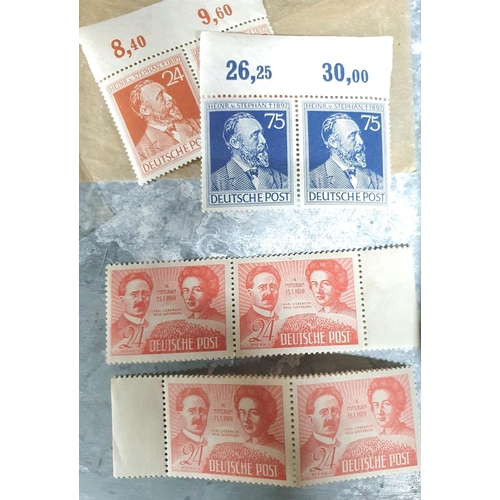 882 - Tin full of unexamined stamps, appear to by mainly mint unmounted and used German 20thC (Qty)