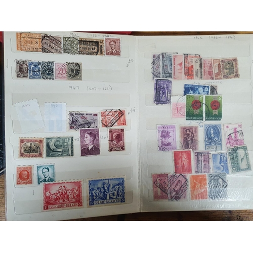 916 - Four small world stamp albums with a good quantity of Belgium including many mint examples etc (Qty)