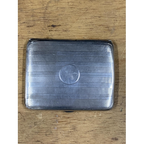 10 - Engine turned London 1914 silver cigarette case,

80 grams