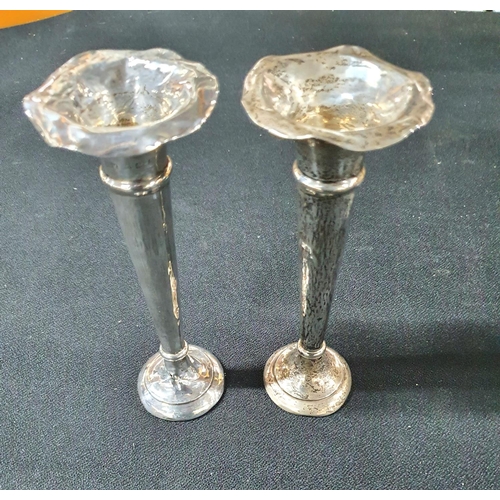 20 - Pair of silver vases with weighted bases (2)