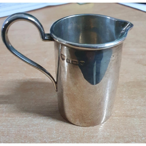 37 - Birmingham 1931 silver milk jug in plain Art Deco period style,

65 grams