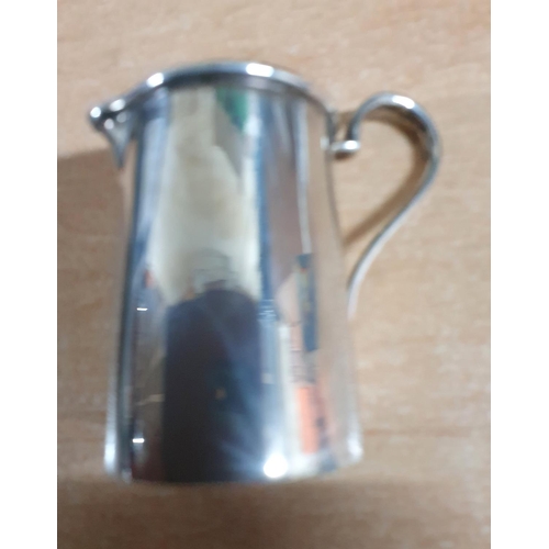 37 - Birmingham 1931 silver milk jug in plain Art Deco period style,

65 grams