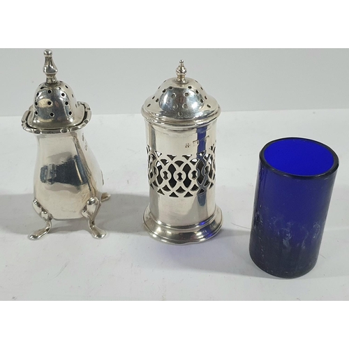 46 - Two British hallmarked silver pepper pots, one with blue glass liner (2),

Total silver weight - 42 ... 